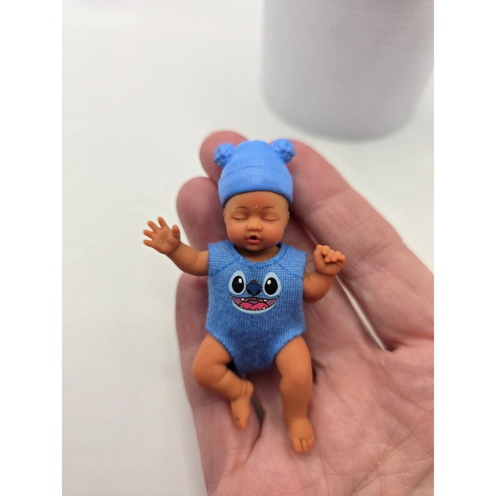 ZURU Miniature Silicone Baby Dolls Set Blue Disney Stitch Romper & Cloud Bib 3" - Picture 2 of 6
